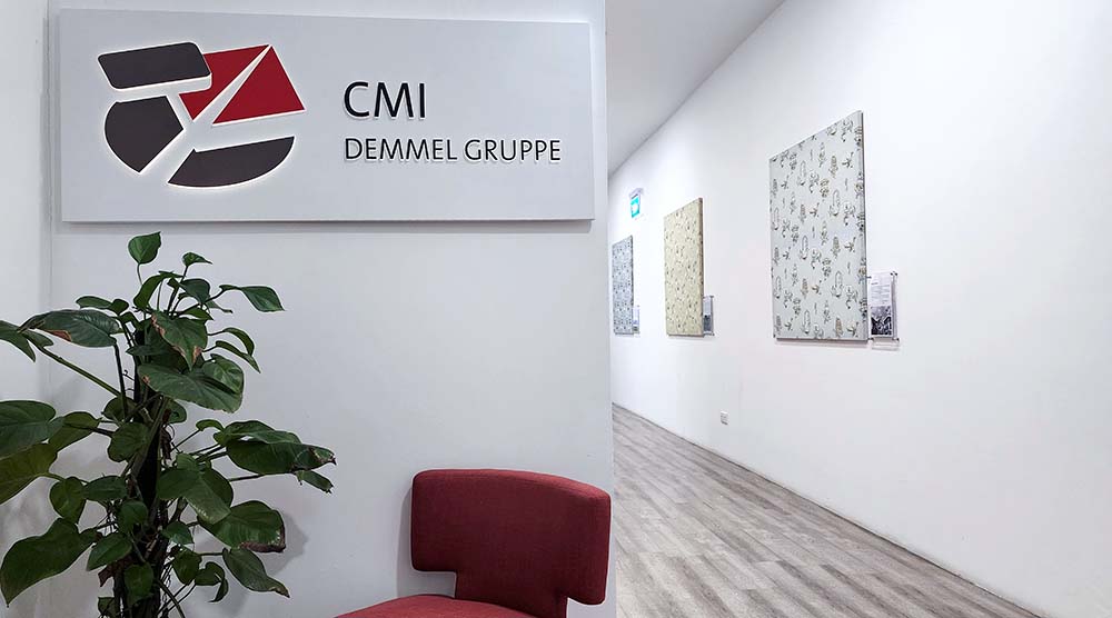 Old CMI Company Logo On Office Wall